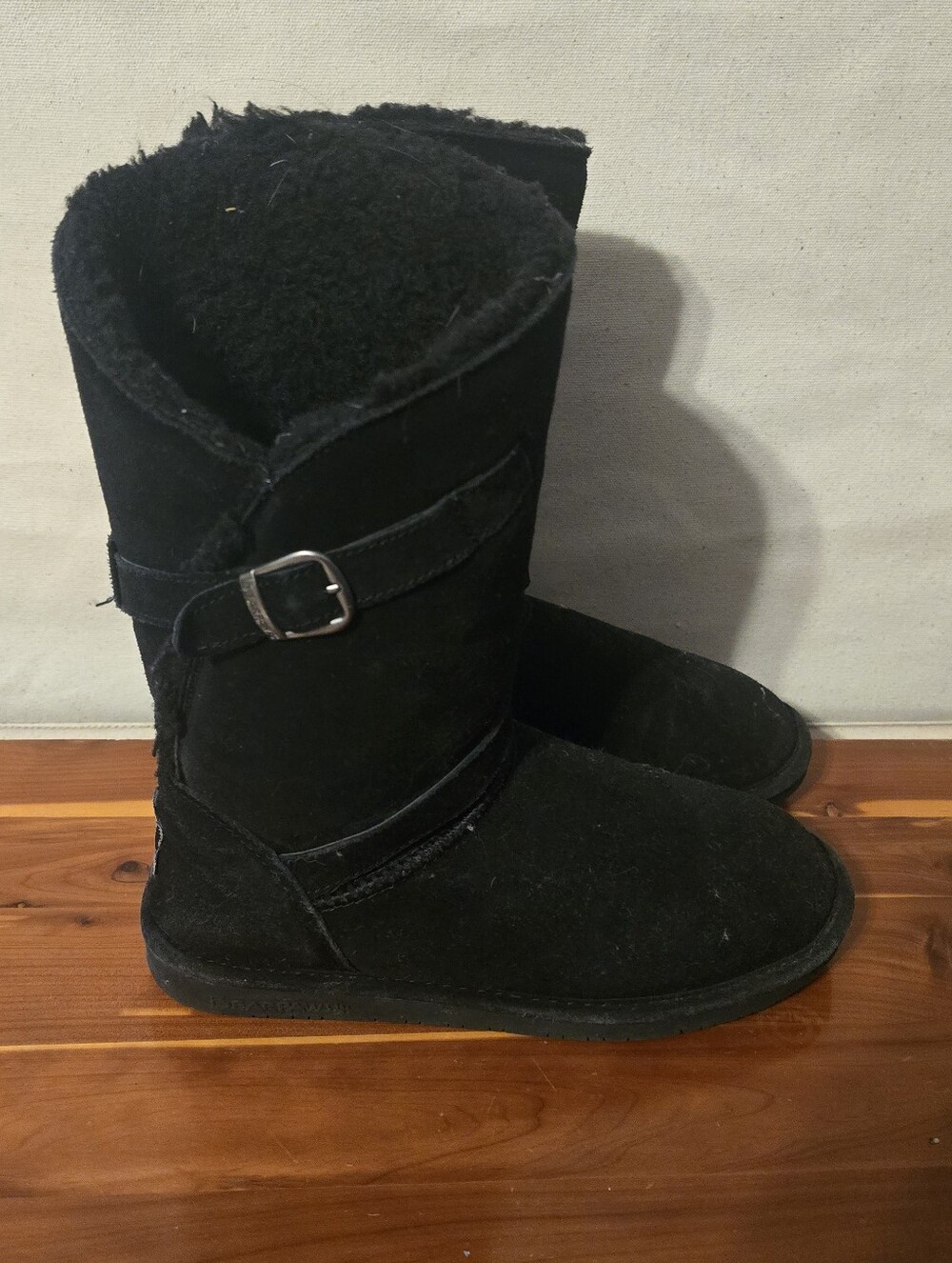 BearPaw tall black sheepskin lined boots